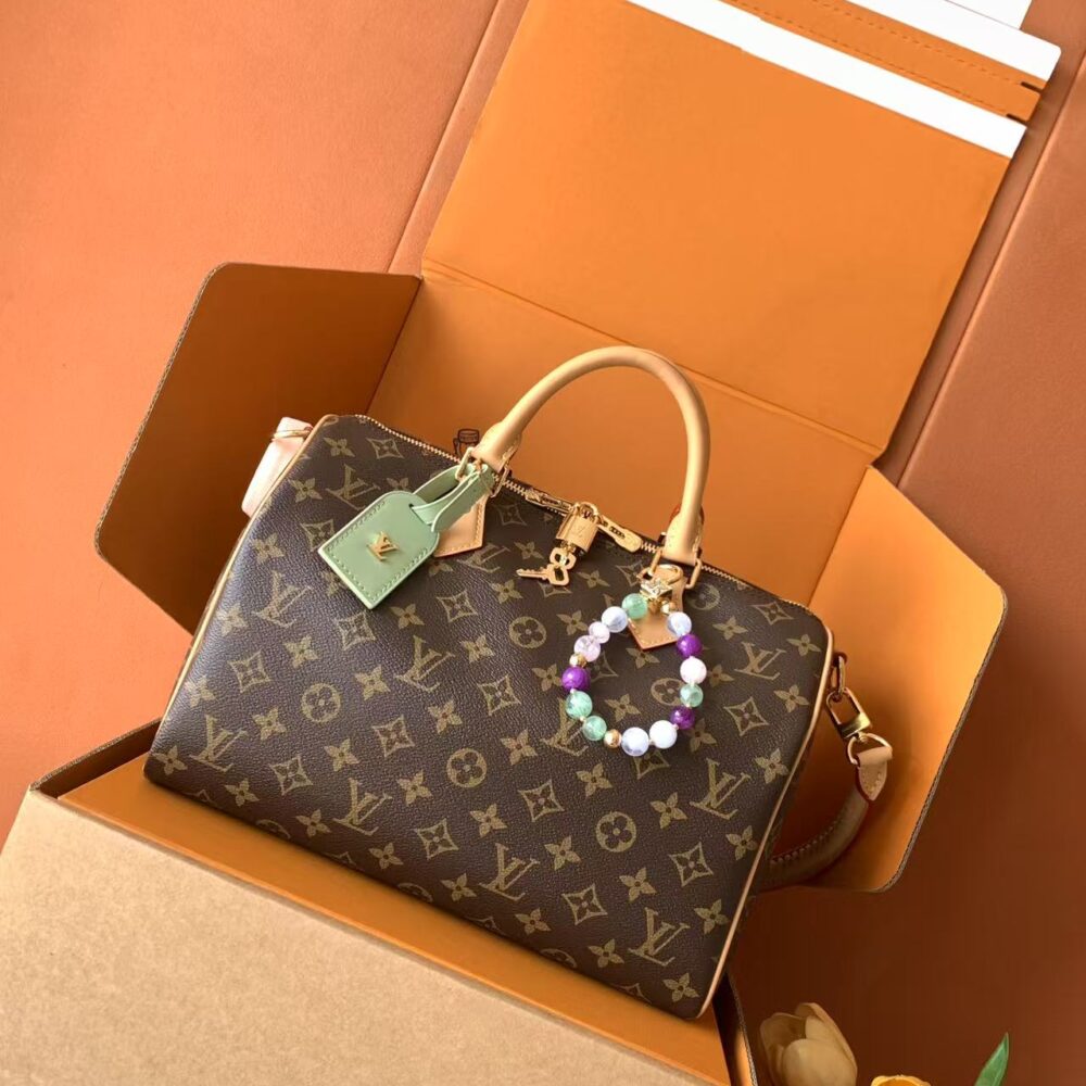 Premium all steel. The M15107 Speedy Soft 30 Lucky handbag features VVN leather trims